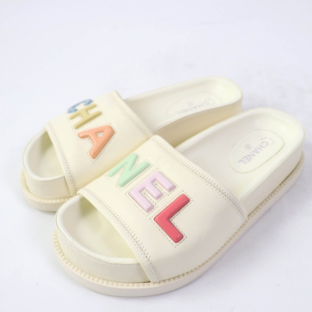 Great CHANEL Sandals Multicoloured logo slide sandals Ivory leather 35 G38933