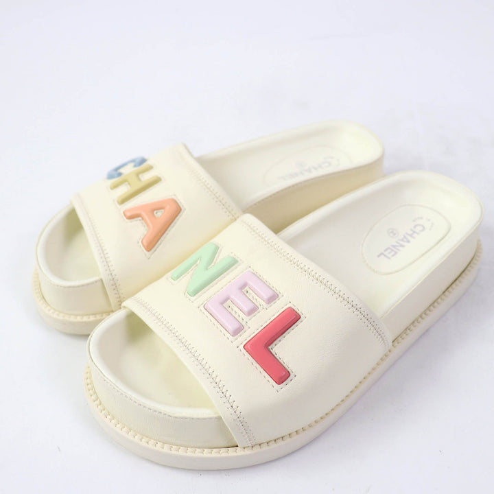 Great CHANEL Sandals Multicoloured logo slide sandals Ivory leather 35 G38933