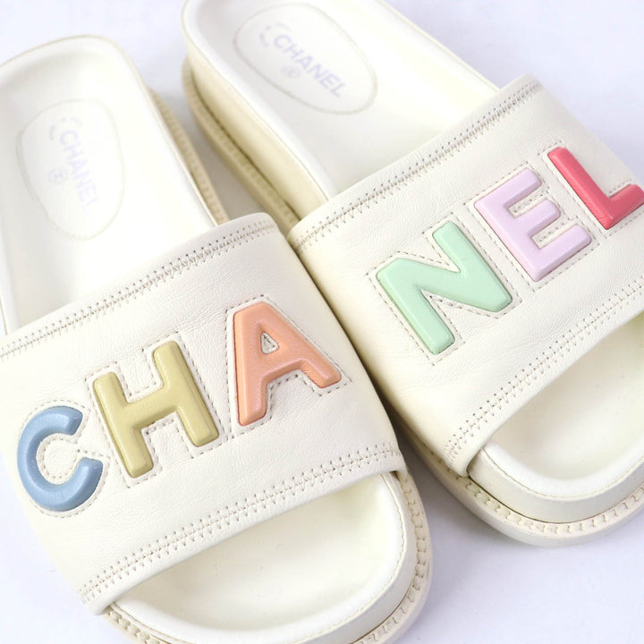 Great CHANEL Sandals Multicoloured logo slide sandals Ivory leather 35 G38933