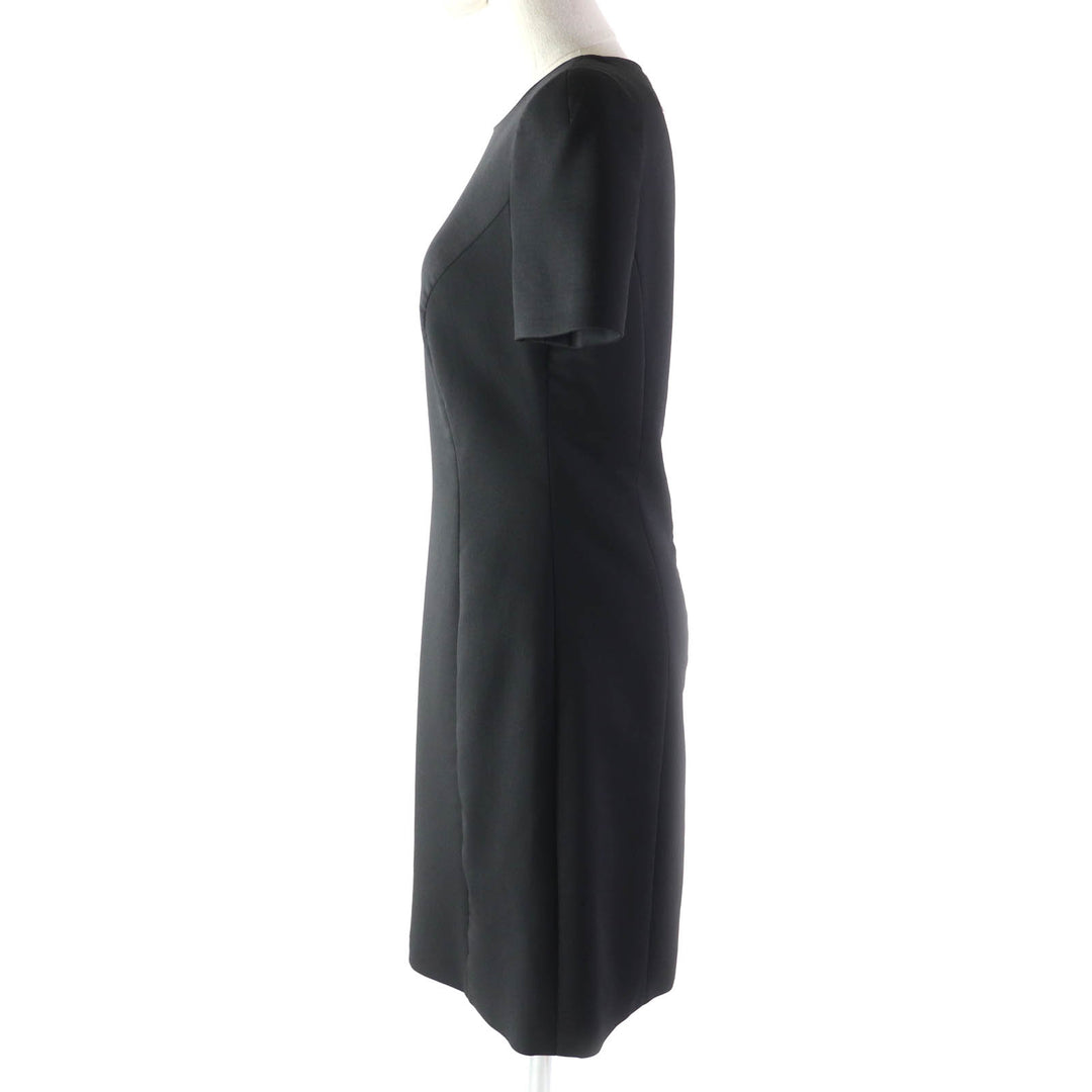 Great VERSACE one piece Medusa top, back zip, knee length, short sleeves black wool Women 40