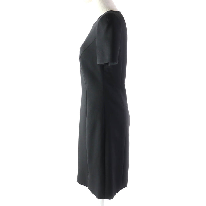 Great VERSACE one piece Medusa top, back zip, knee length, short sleeves black wool Women 40