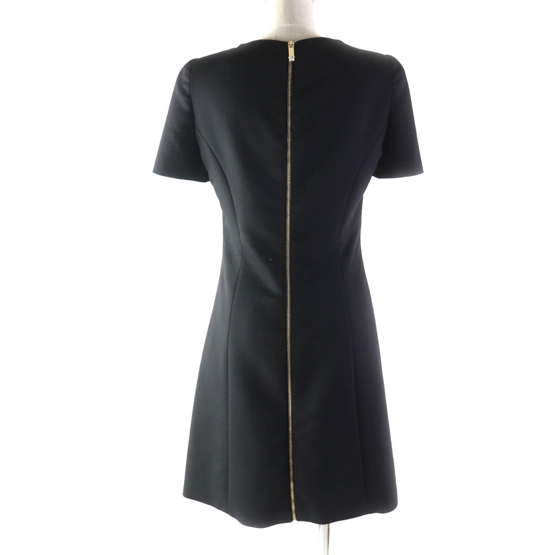 Great VERSACE one piece Medusa top, back zip, knee length, short sleeves black wool Women 40