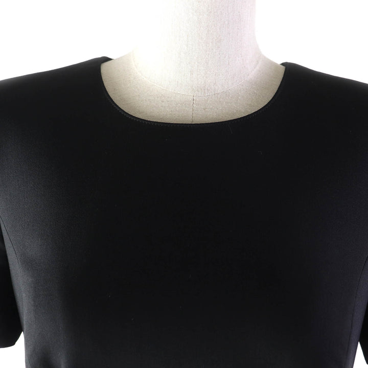 Great VERSACE one piece Medusa top, back zip, knee length, short sleeves black wool Women 40