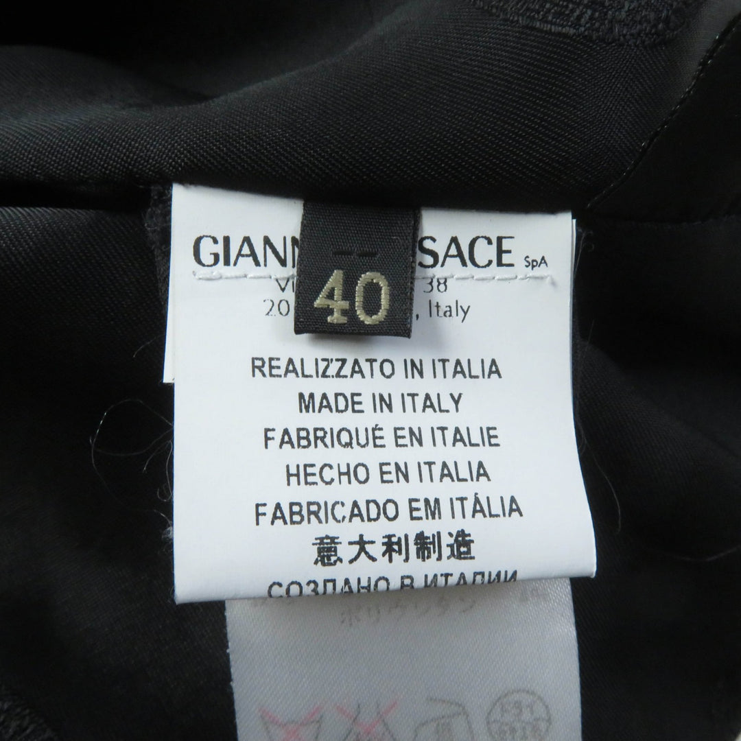 Great VERSACE one piece Medusa top, back zip, knee length, short sleeves black wool Women 40