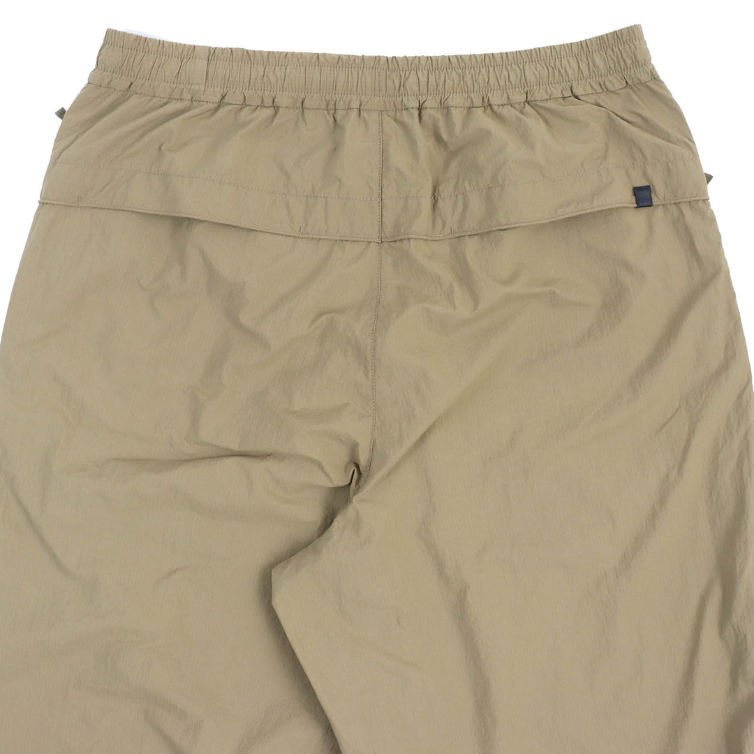 Discounted Pristine DAIWA PIER39 Pants TECH WINDBREAKER PANTS Coyote Nylon mens M BP-31022W