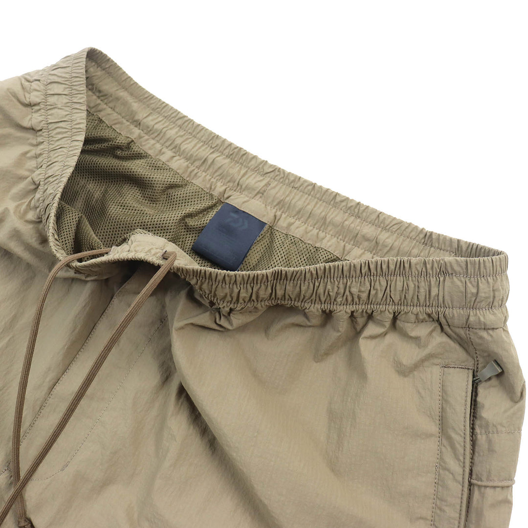 Discounted Pristine DAIWA PIER39 Pants TECH WINDBREAKER PANTS Coyote Nylon mens M BP-31022W