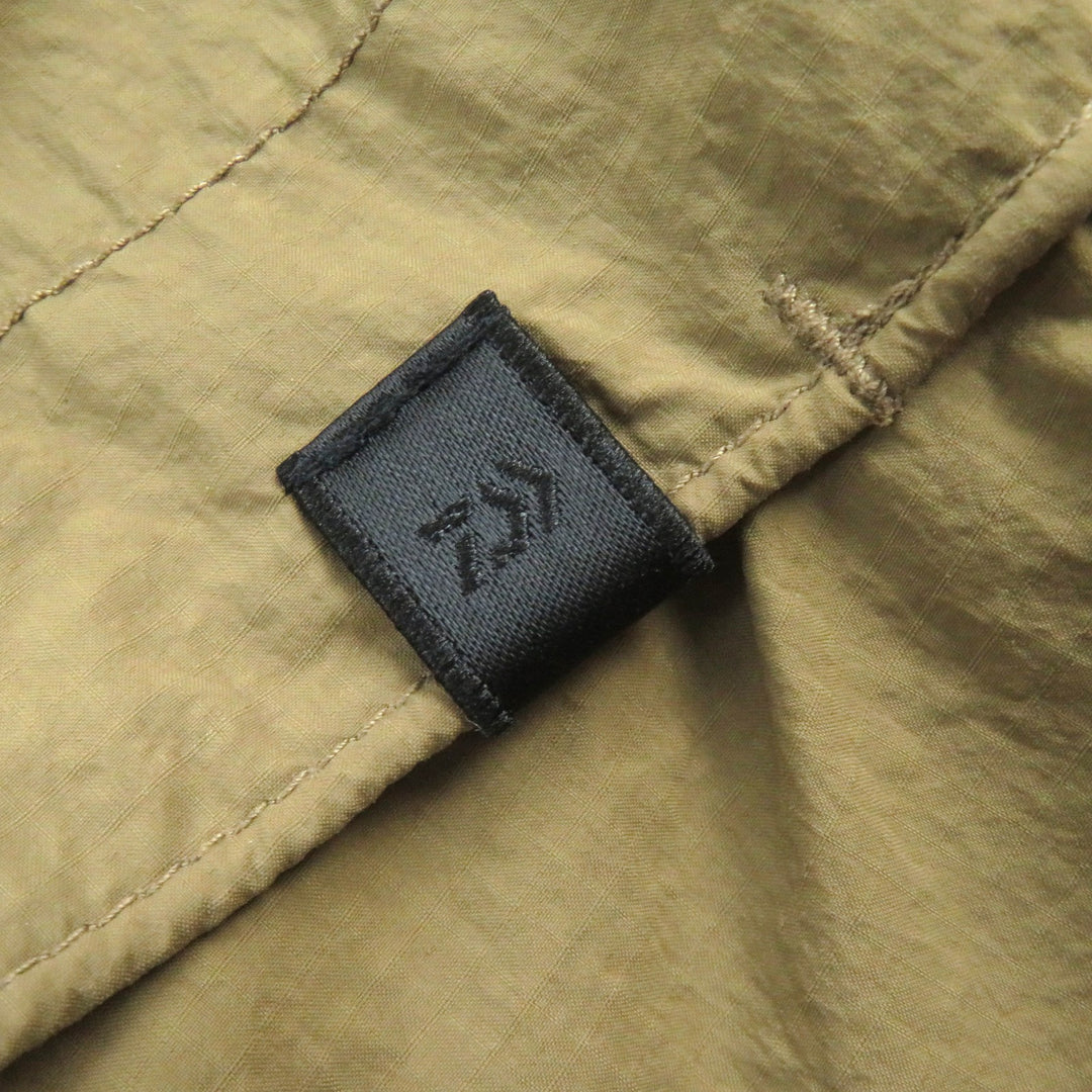 Discounted Pristine DAIWA PIER39 Pants TECH WINDBREAKER PANTS Coyote Nylon mens M BP-31022W