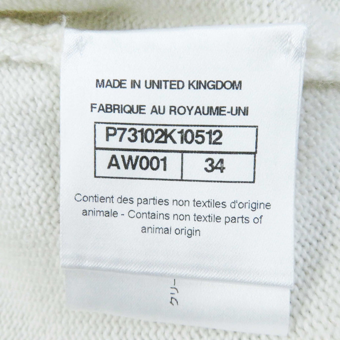 Excellent CHANEL cardigan with decorative COCO Mark buttons white cashmere Women 34 P73102