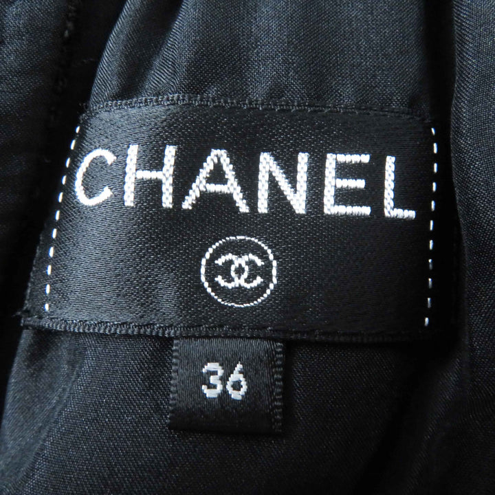 Excellent CHANEL skirt COCO Mark button with rhinestones Tweed black Women 36 21C P70024