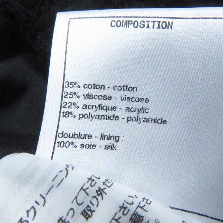 Excellent CHANEL skirt COCO Mark button with rhinestones Tweed black Women 36 21C P70024