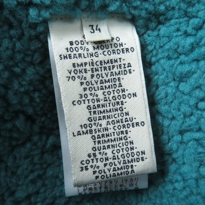 Great HERMES Mouton coat Serie buttoned switch design green Sheep leather Women 34