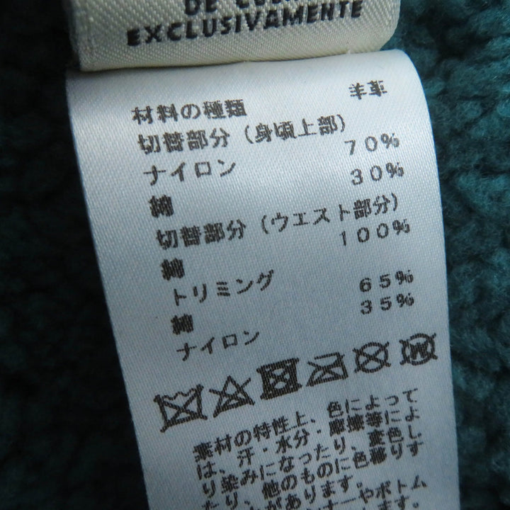 Great HERMES Mouton coat Serie buttoned switch design green Sheep leather Women 34