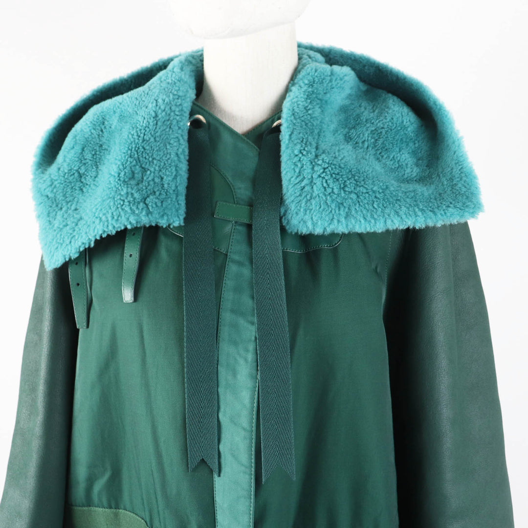 Great HERMES Mouton coat Serie buttoned switch design green Sheep leather Women 34