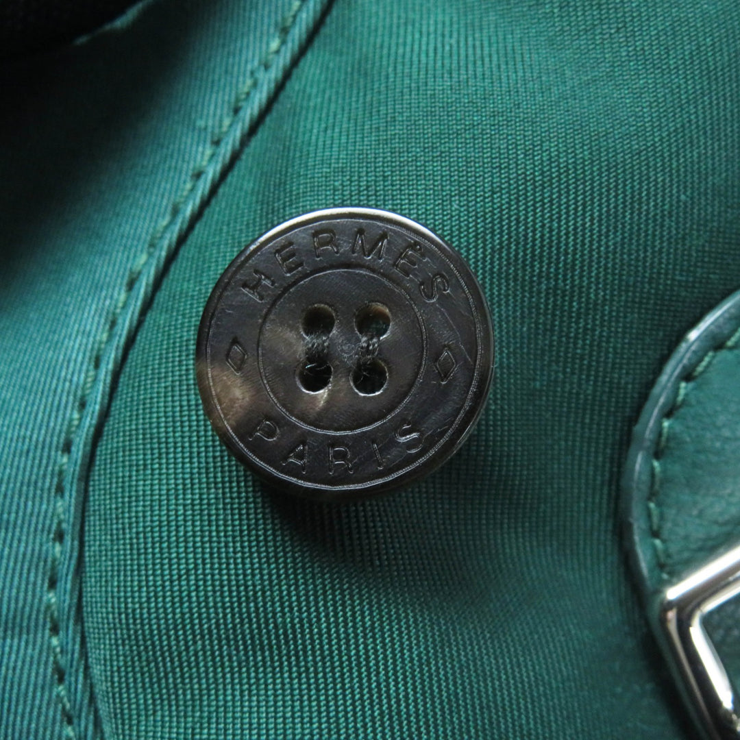Great HERMES Mouton coat Serie buttoned switch design green Sheep leather Women 34