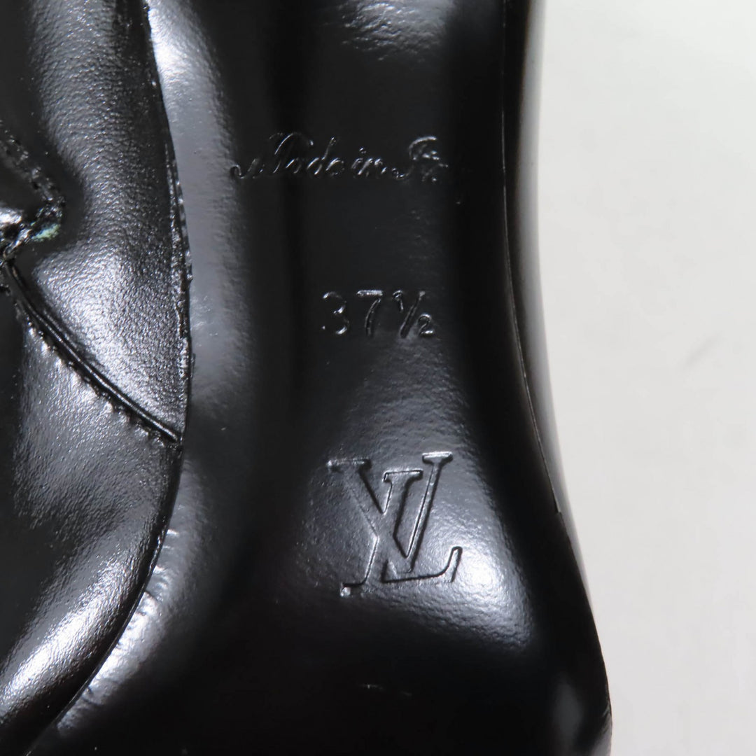 Excellent LOUIS VUITTON Ankle boots LV logo pointed toe Black White leather Women 37.5