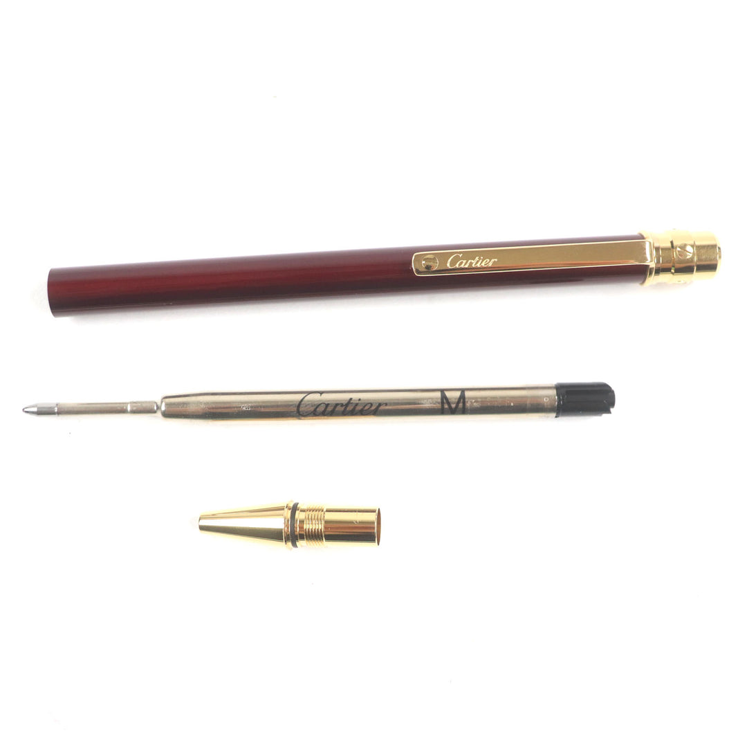 Excellent Cartier Ballpoint pen Santos de Cartier Bordeaux gold mens