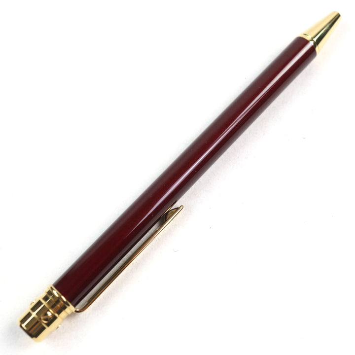 Excellent Cartier Ballpoint pen Santos de Cartier Logo engraved twist style Bordeaux gold