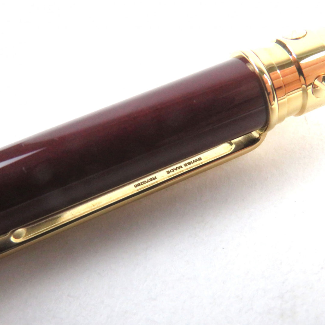 Excellent Cartier Ballpoint pen Santos de Cartier Logo engraved twist style Bordeaux gold