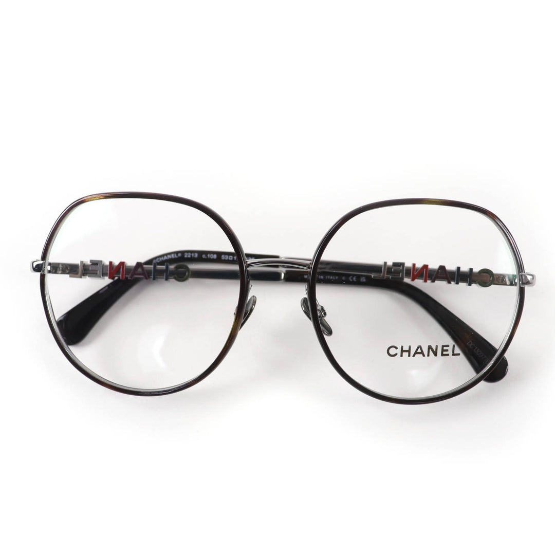 Excellent CHANEL Glasses With logo Clear brown (marble) metal Women 2213