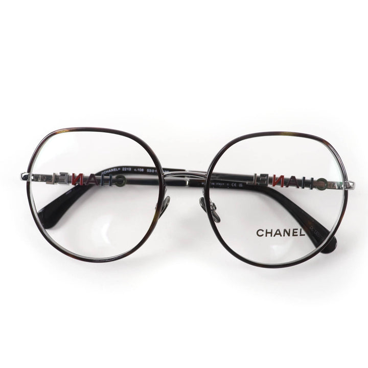 Excellent CHANEL Glasses With logo Clear brown (marble) metal Women 2213