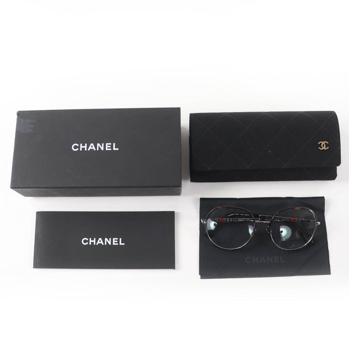 Excellent CHANEL Glasses With logo Clear brown (marble) metal Women 2213