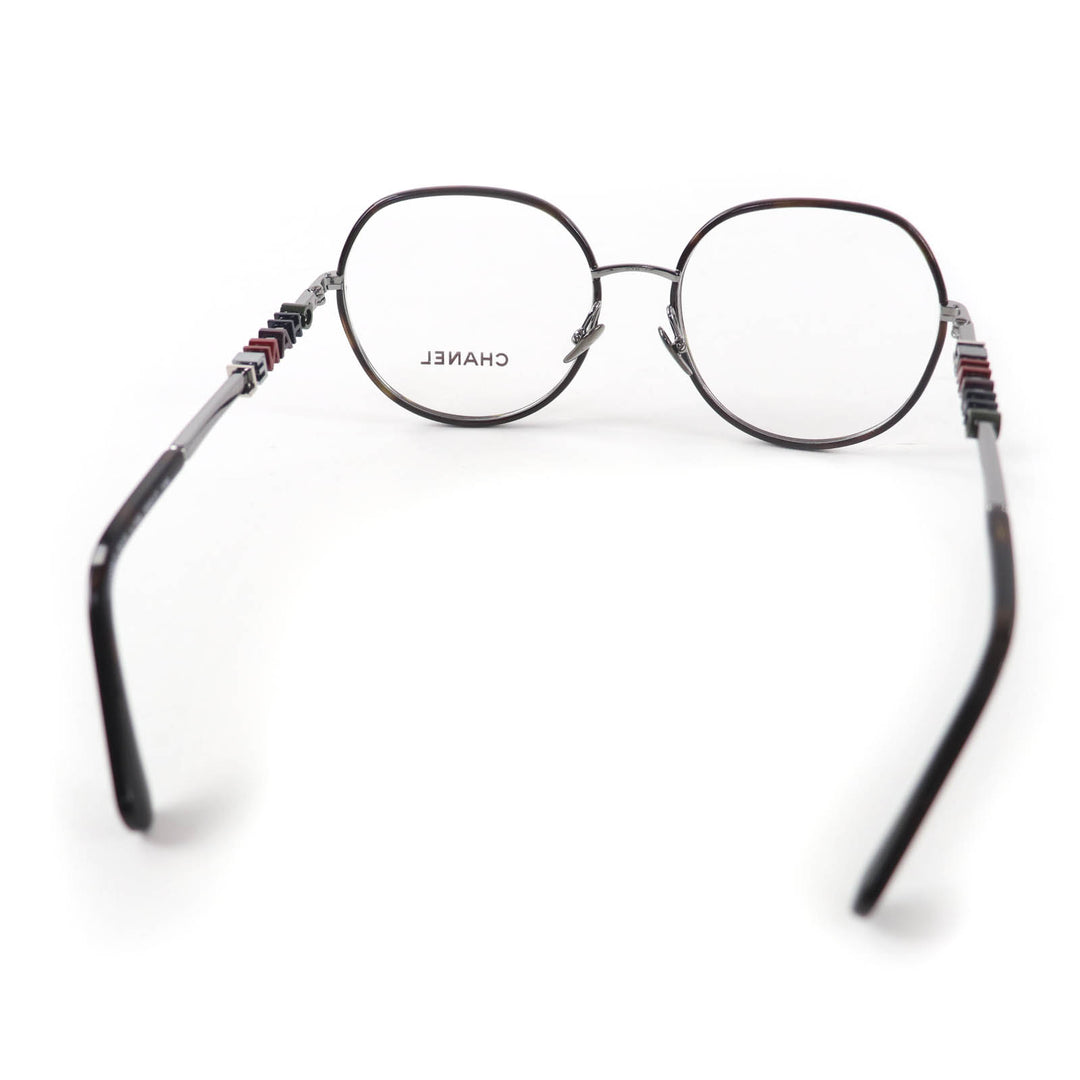 Excellent CHANEL Glasses With logo Clear brown (marble) metal Women 2213
