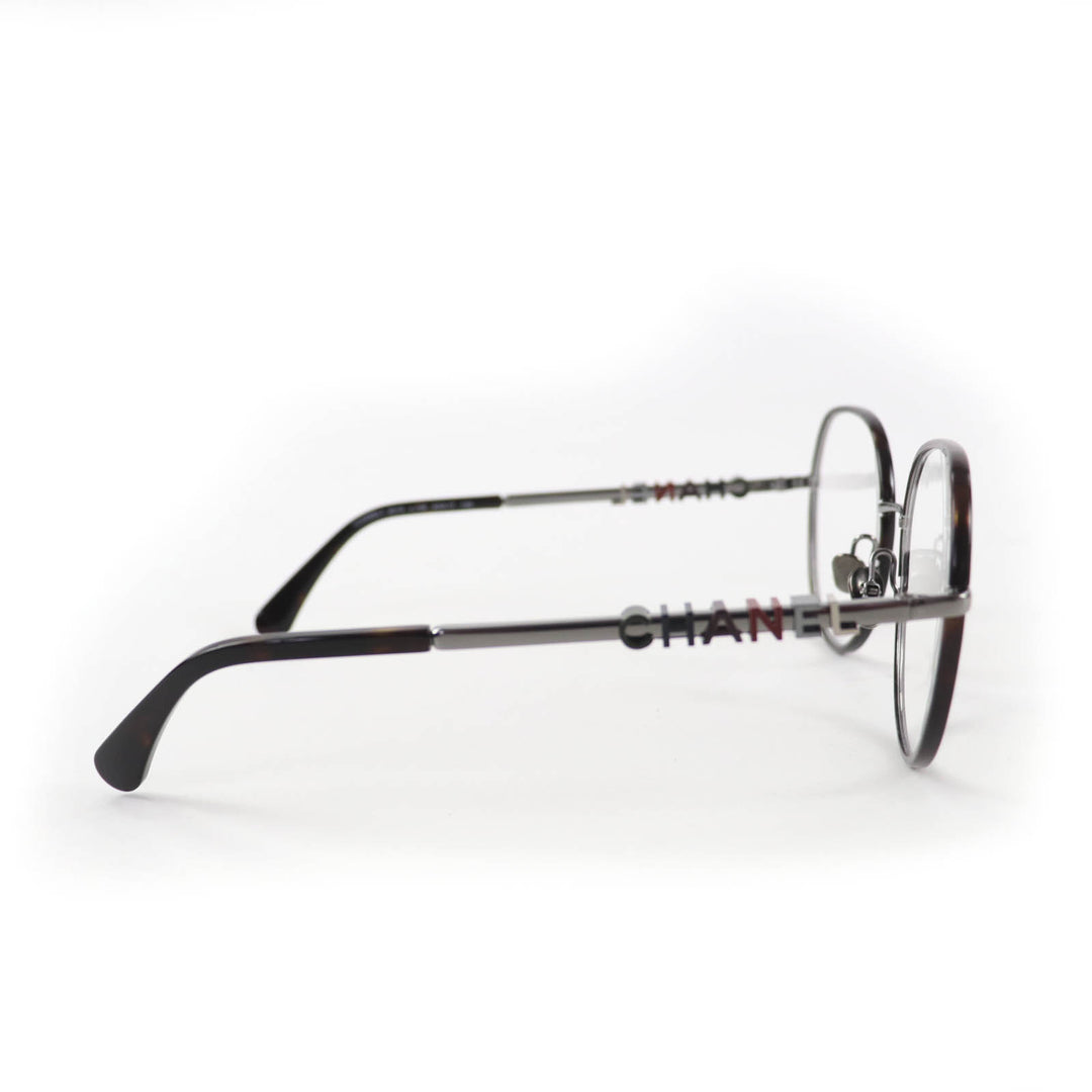 Excellent CHANEL Glasses With logo Clear brown (marble) metal Women 2213