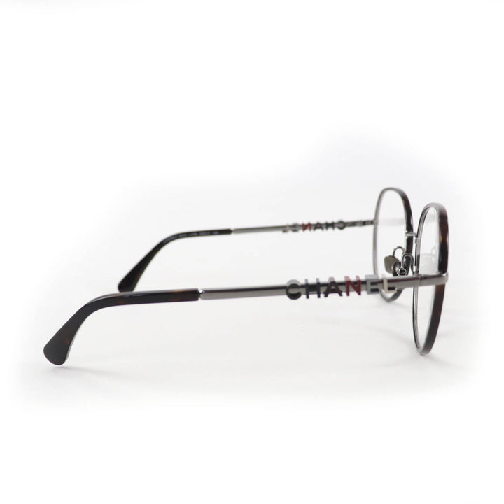 Excellent CHANEL Glasses With logo Clear brown (marble) metal Women 2213