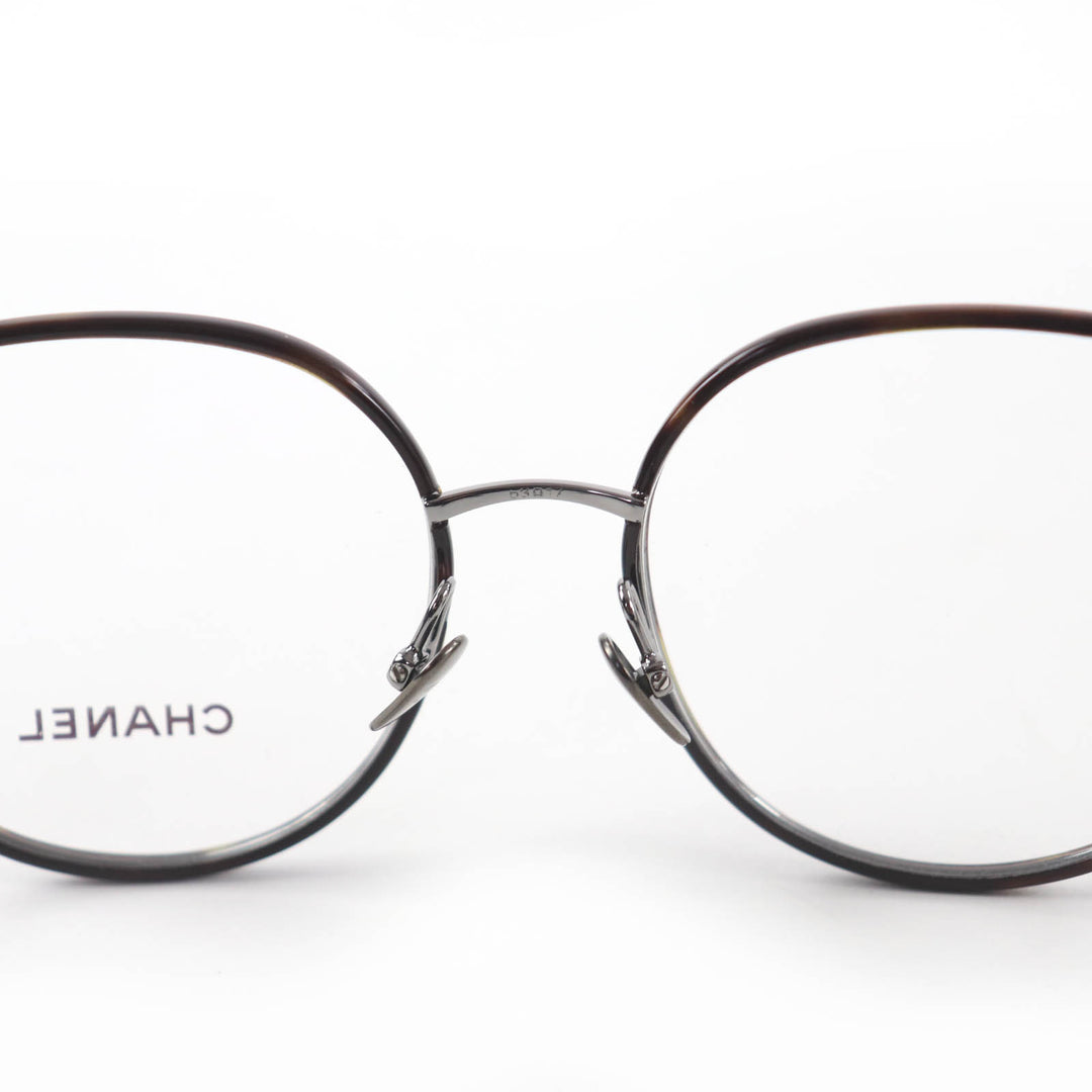 Excellent CHANEL Glasses With logo Clear brown (marble) metal Women 2213