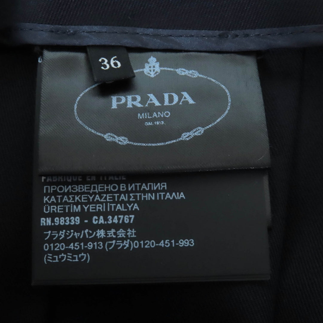 Excellent PRADA Pleated skirt Wool gabardine mini skirt with metal ring and 36