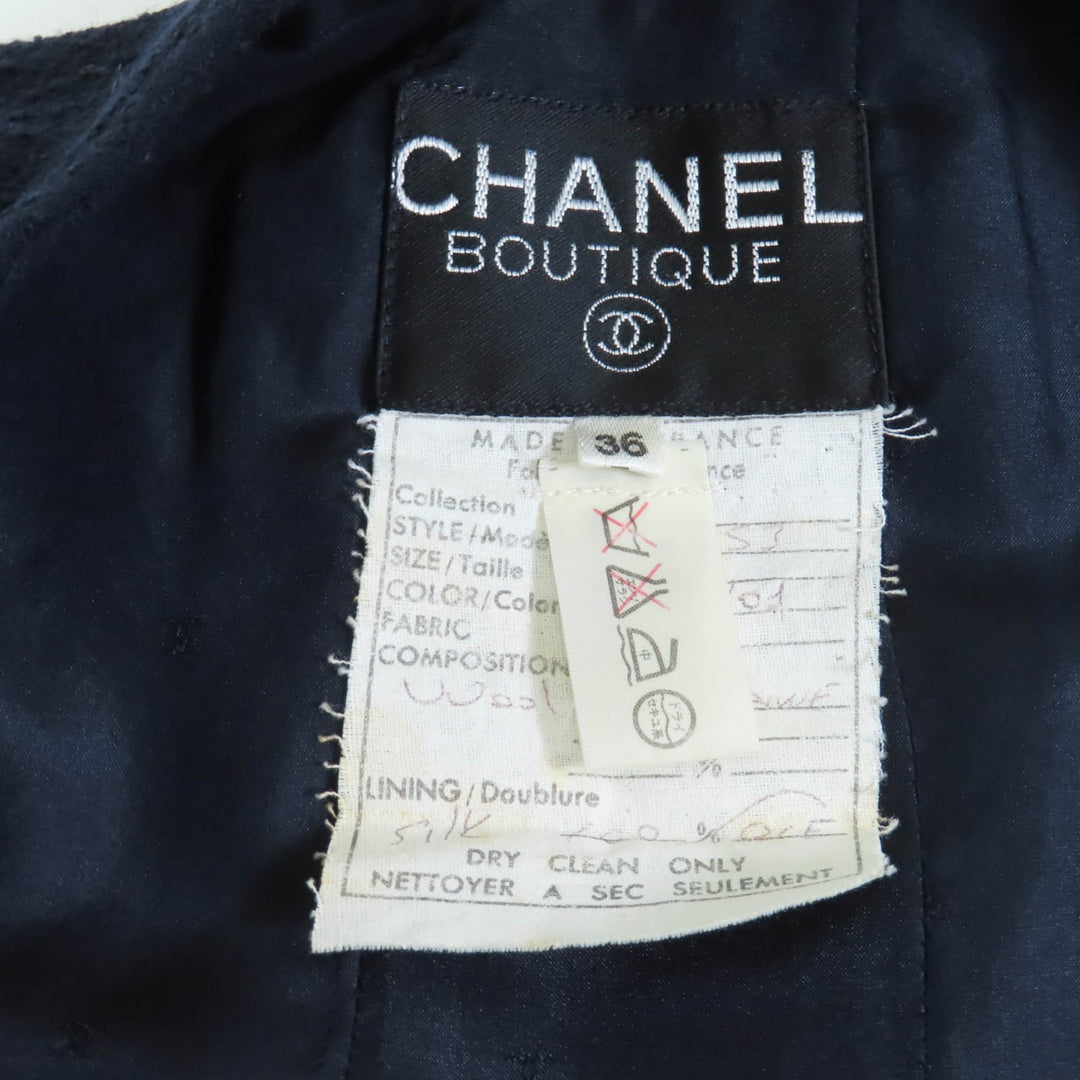 Excellent CHANEL BOUTIQUE suit 90s collarless tweed jacket and skirt 36