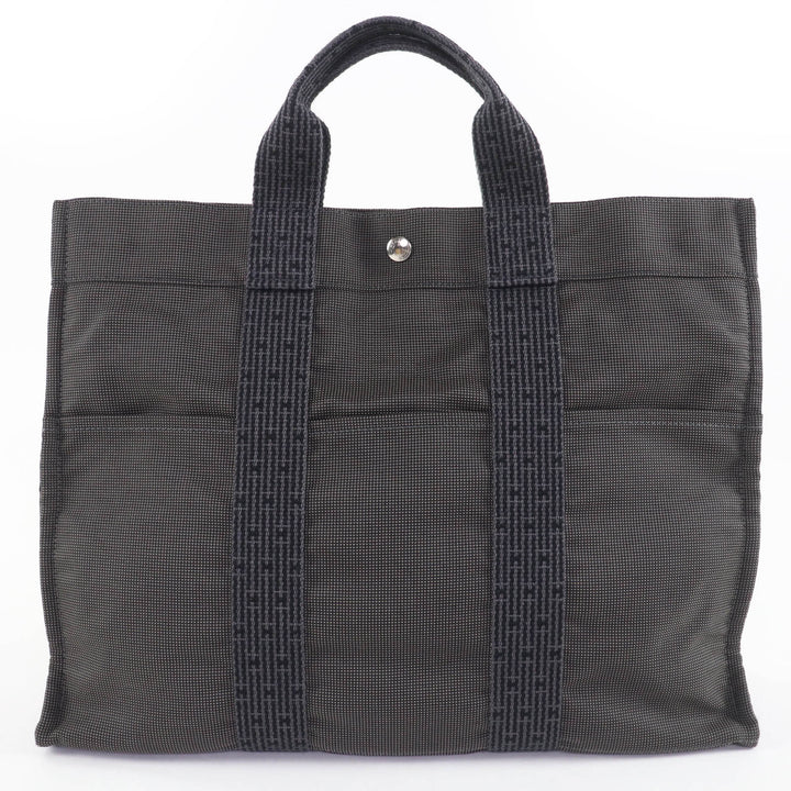 素晴らしいHERMESハンドバッグ Her Line MM キャンバストートバッグ カデナとキー付き グレー