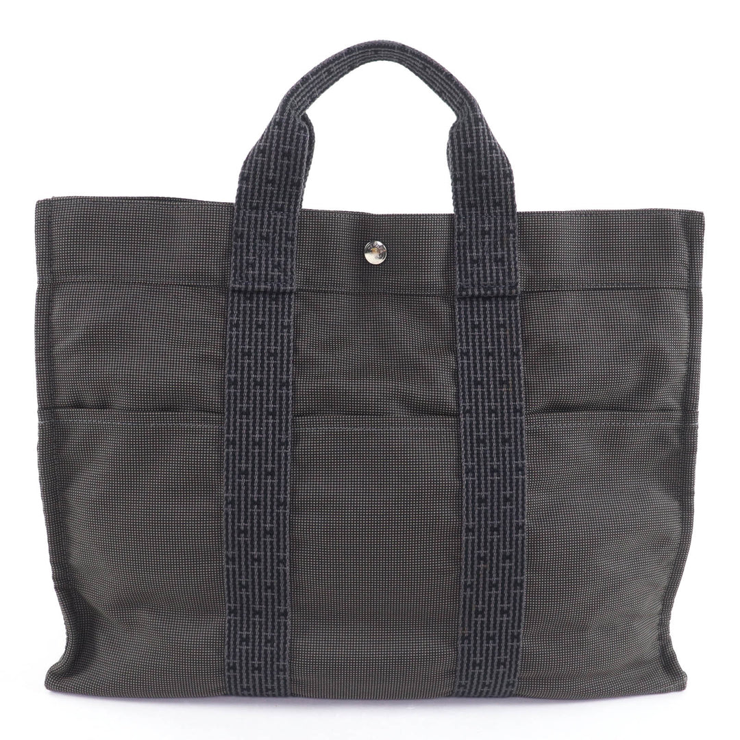 素晴らしいHERMESハンドバッグ Her Line MM キャンバストートバッグ カデナとキー付き グレー