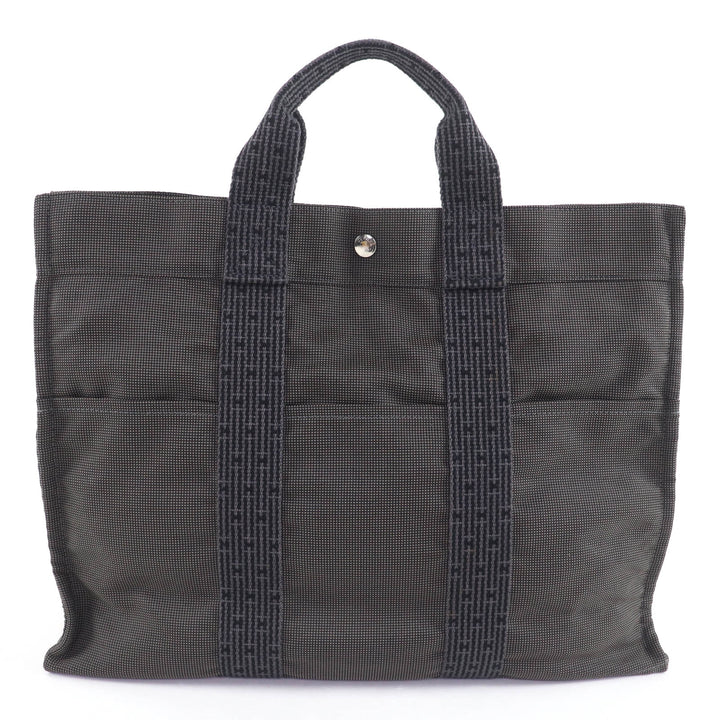 素晴らしいHERMESハンドバッグ Her Line MM キャンバストートバッグ カデナとキー付き グレー