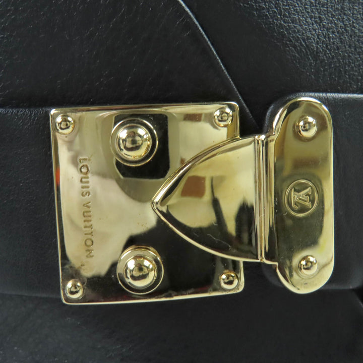 素晴らしい LOUIS VUITTON ブーティ バックル ウェッジ レザー ショートブーツ ブラック レザー レディース 35