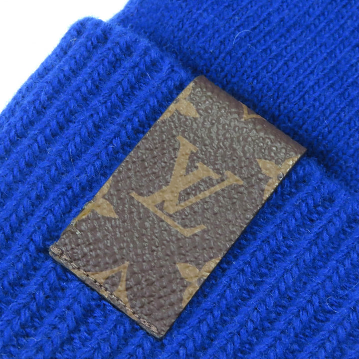 Excellent LOUIS VUITTON gloves LV medallion maille glove blue wool Women S