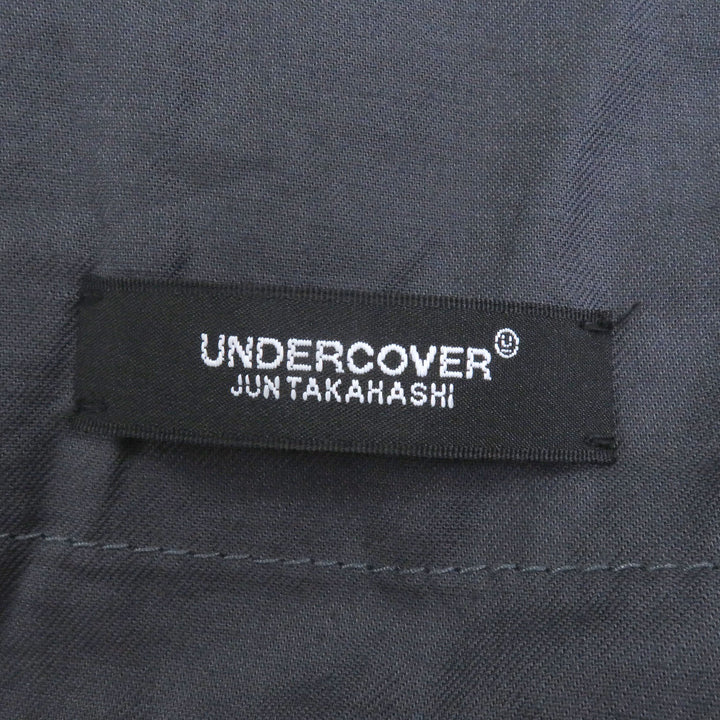 崭新的 UNDERCOVER 裤子，饰有 Pink Floyd《月之暗面》刺绣