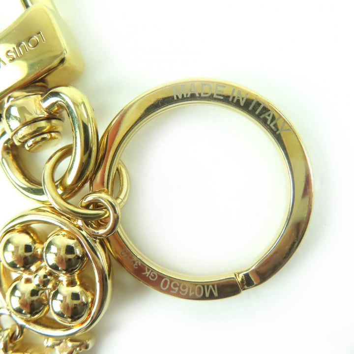 Excellent LOUIS VUITTON key ring LV Wonder of the Sea Bag charm gold M01650