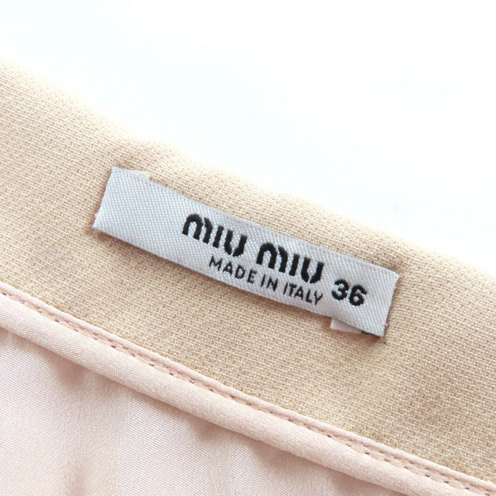 素晴らしいMIUMIUミニスカートビジューとエコパールピンクベージュウール36 MG1048