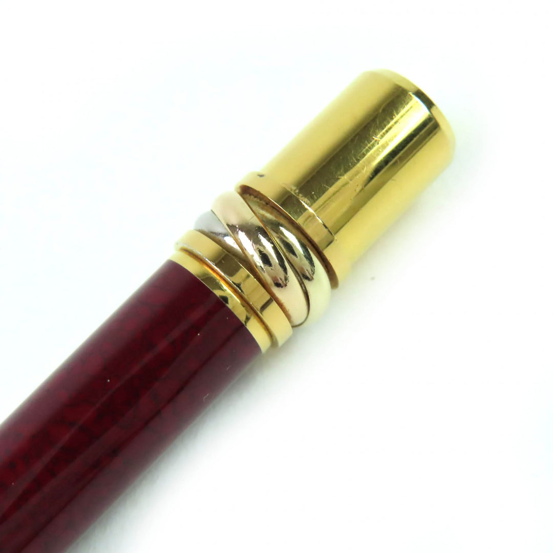 Very Good Cartier Ballpoint pen Trinity Marble Pattern Twist Type Bordeaux gold