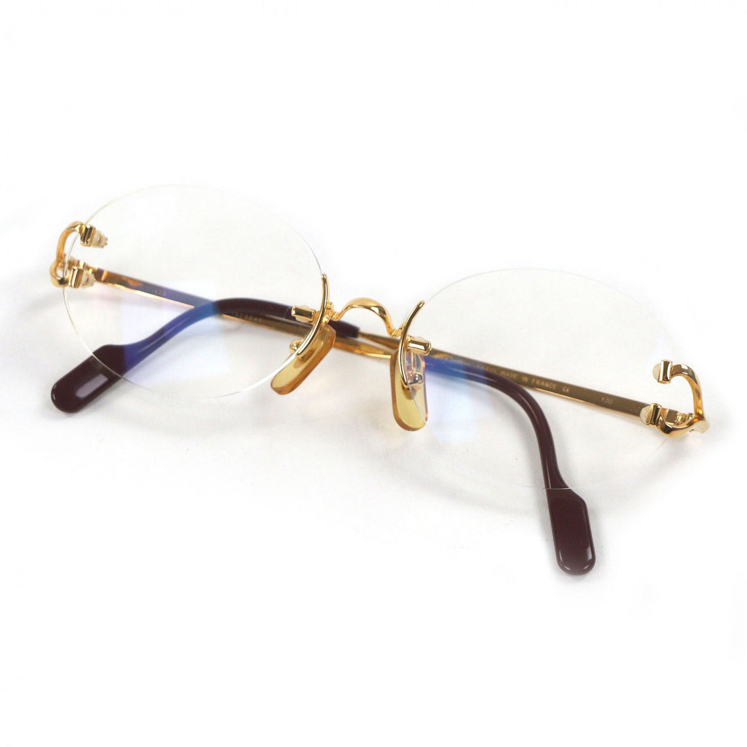 Great Cartier Glasses C logo oval lens two-point rimless gold