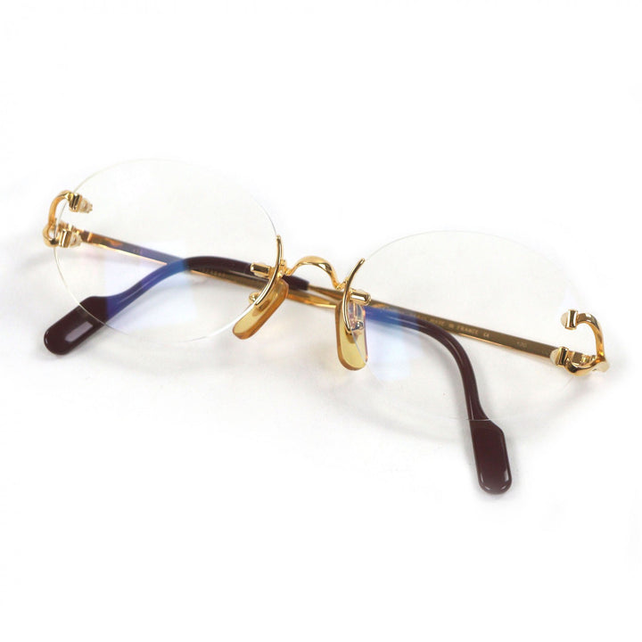 Great Cartier Glasses C logo oval lens two-point rimless gold