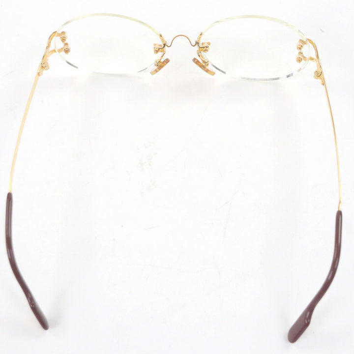 Great Cartier Glasses C logo oval lens two-point rimless gold