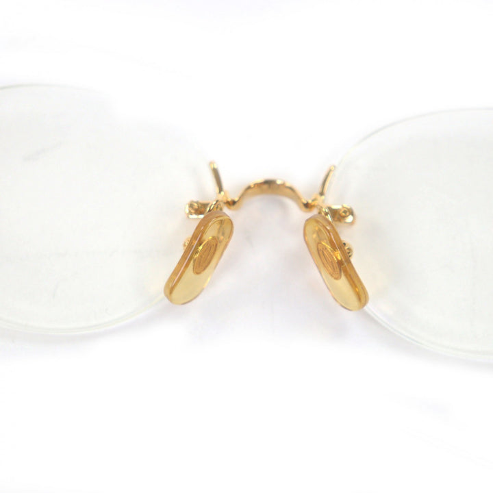 Great Cartier Glasses C logo oval lens two-point rimless gold