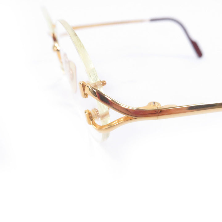 Great Cartier Glasses C logo oval lens two-point rimless gold