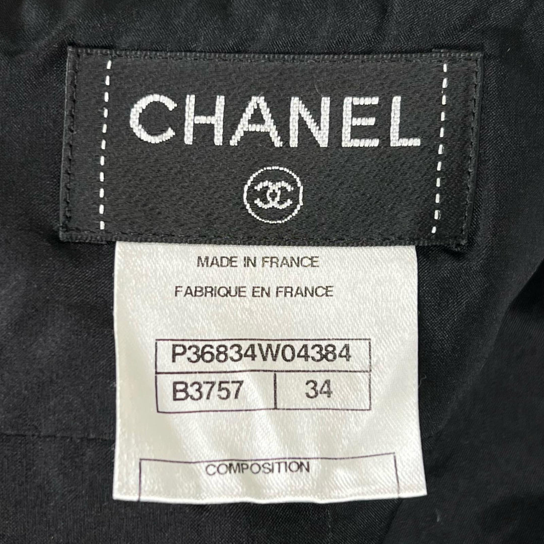 Great CHANEL Tweed skirt COCO Mark black silk Women 34 P36834