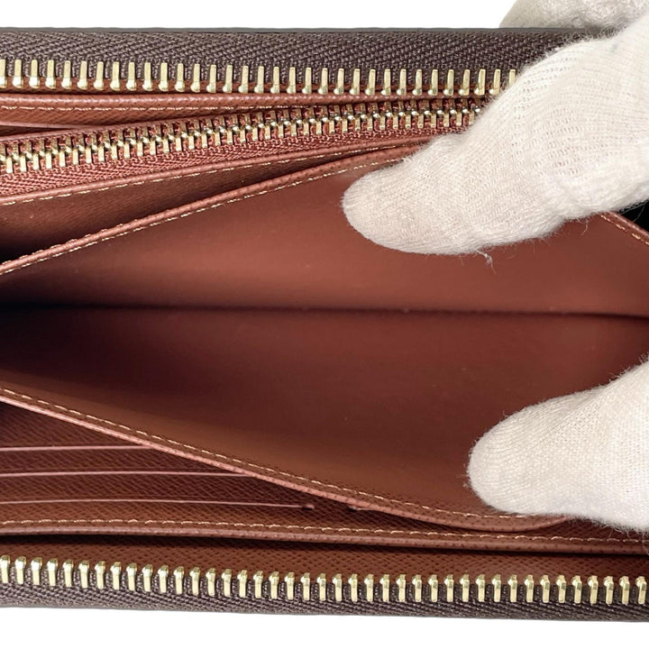 Pristine LOUIS VUITTON Purse Zippy wallet Brown Monogram canvas Women M42616