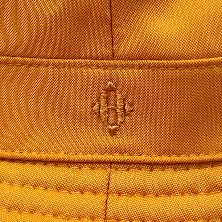 Pristine HERMES hat H logo embroidered down brim bucket Orange polyester 56