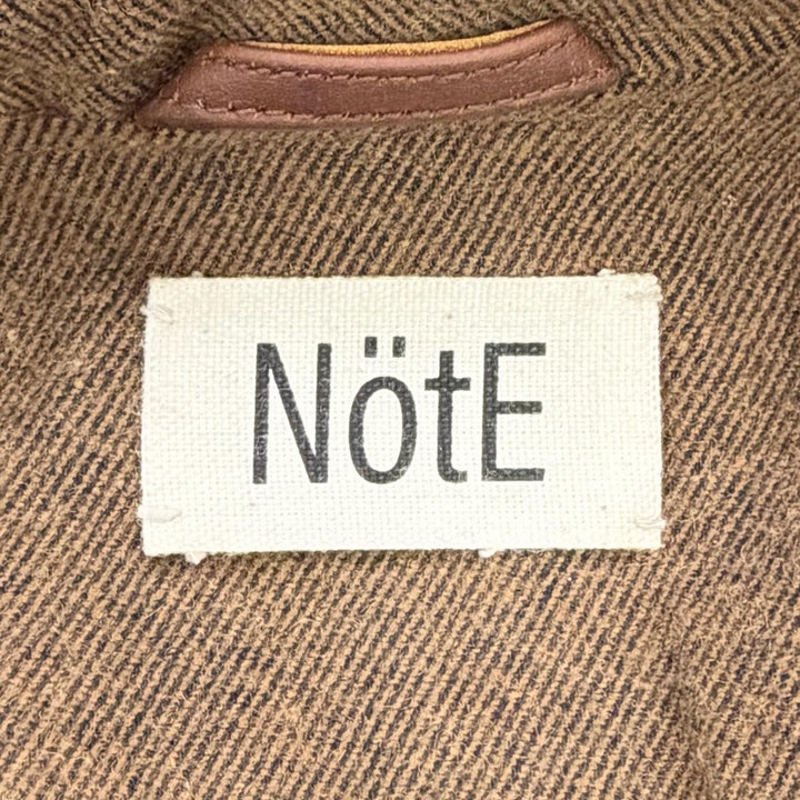 Very Good NotE coat Long leather coat with belt, 100% wool lining. 46 25-005