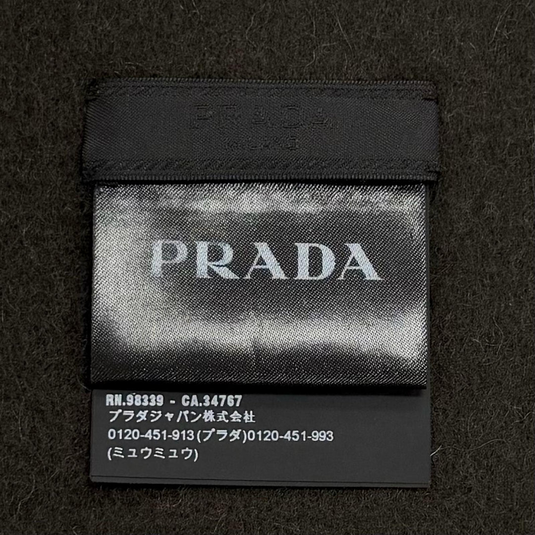 Great PRADA Scarf Plain fabric with embroidered logo and fringe. Dark brown wool